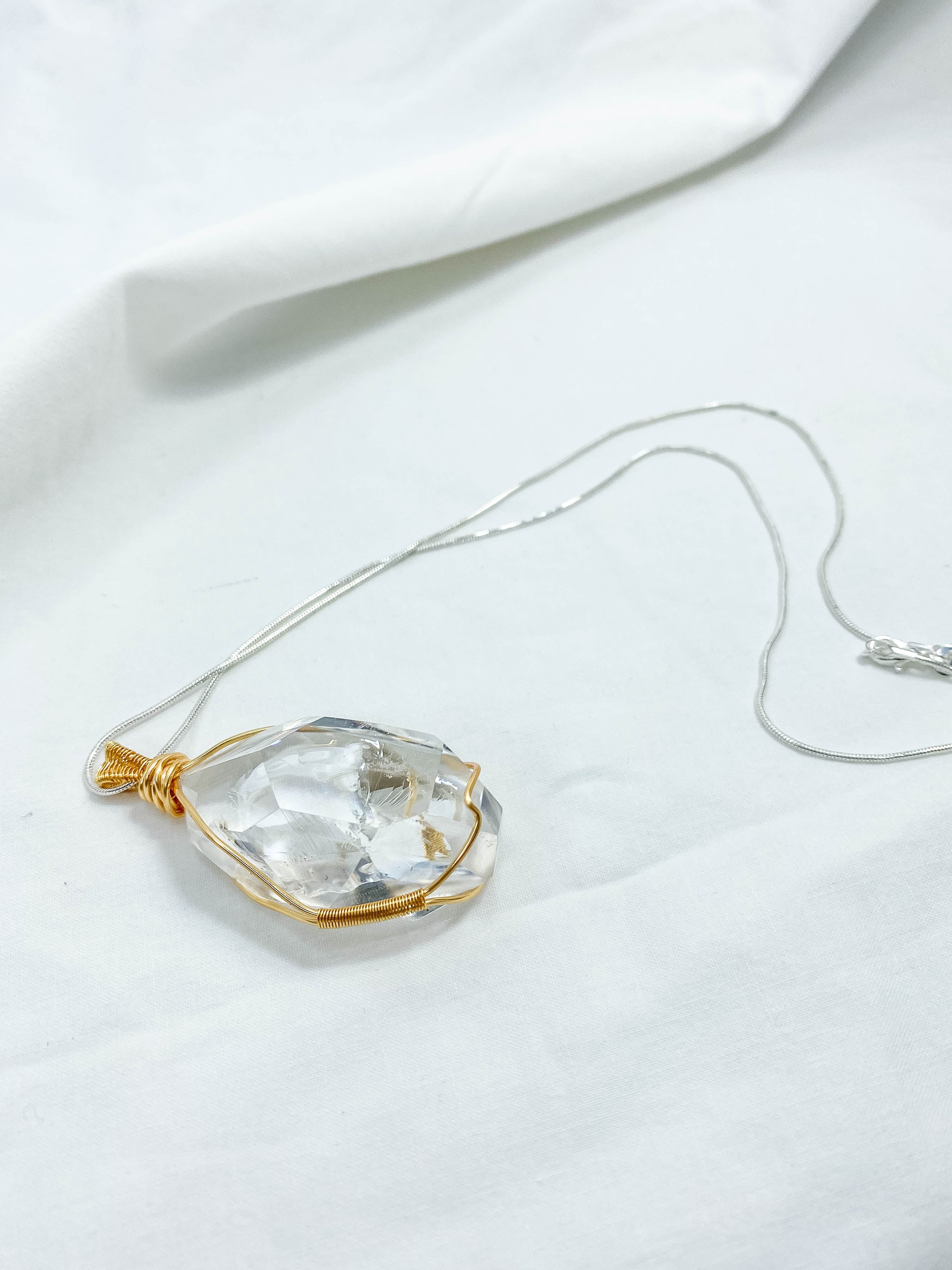 Enchanted Clear Quartz Gold Wrapped Rainbow Pendant