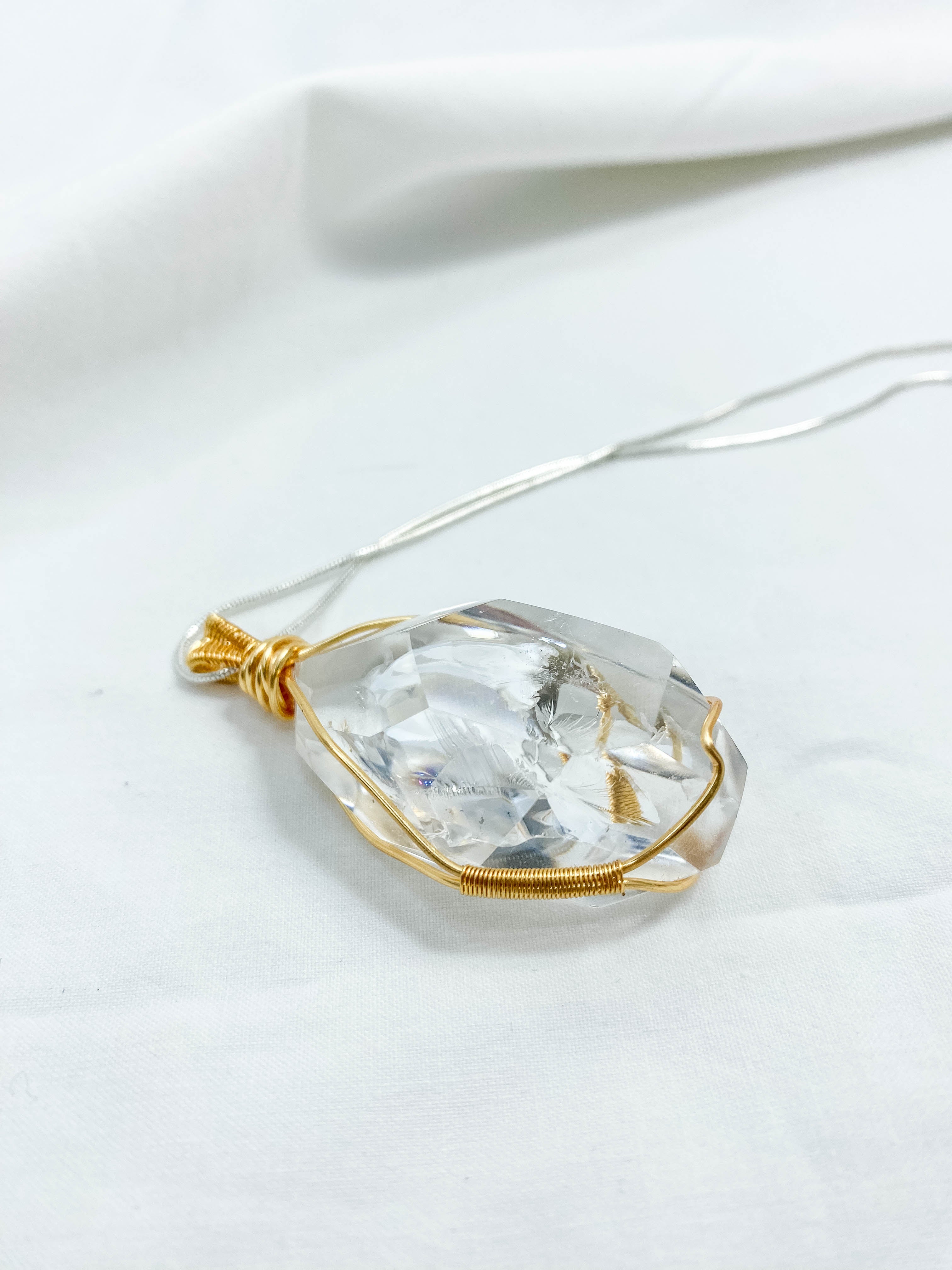 Enchanted Clear Quartz Gold Wrapped Rainbow Pendant