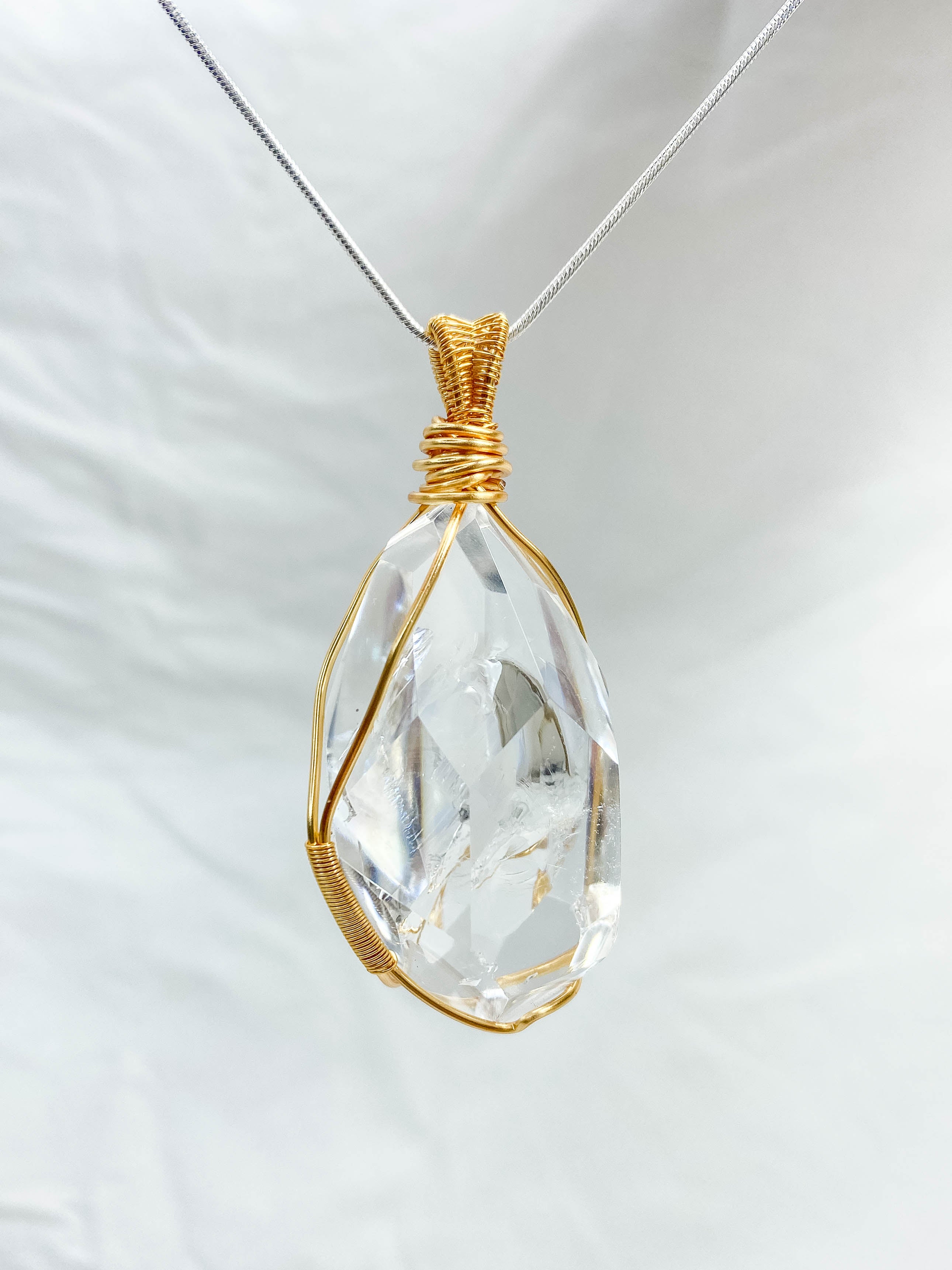 Enchanted Clear Quartz Gold Wrapped Rainbow Pendant