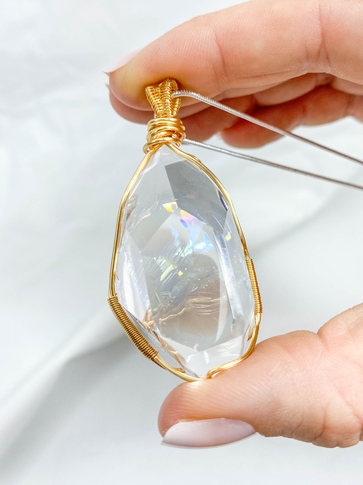 Enchanted Clear Quartz Gold Wrapped Rainbow Pendant